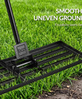 Wide 30 By 10 Inch Lawn Leveling Rake With Heavy Duty Alloy Steel Frame And 78 Inch Handle For Smoothing Soil And Leveling Yards Gardens Landscaping And Golf Course Prep shown on grass