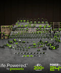 Greenworks PowerAll 24V gardening tools, including the Cordless 24V Polesaw And Hedge Trimmer Combo Kit, organized on display.