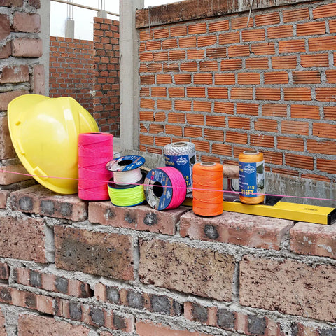 Fluorescent Pink Twisted Mason Line 425 Feet Size 18 Polypropylene Mason Line String for Masonry Jobs Pack of 6 on construction site
