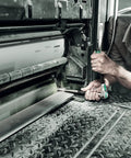 Person using Zyklop Long Extension For Half Inch Square Drive 250mm With Freewheel Sleeve on industrial machinery