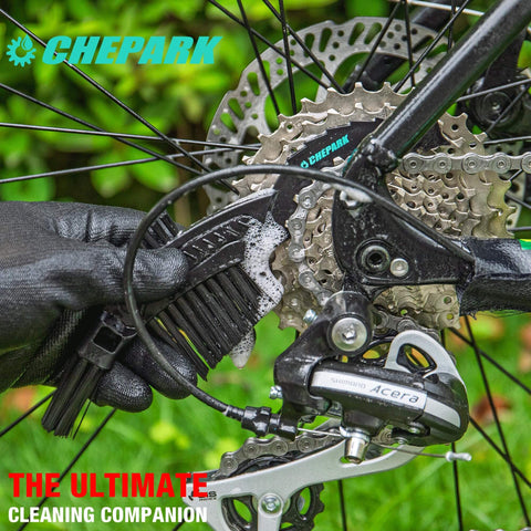 Using Drivetrain Cleaning And Lubrication Essentials Kit With Bicycle Degreaser And Lubricant Brush Tool For Mountain And Road Bikes on rear gear