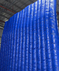 Heavy Duty Inflatable Sound Blocker For Construction Yards, 10x10 ft blue PVC barrier in an upright position.