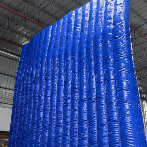 Heavy Duty Inflatable Sound Blocker For Construction Yards, 10x10 ft blue PVC barrier in an upright position.