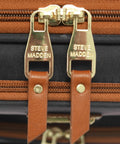 Close-up of brown zipper and gold hardware on 15 Inch Carry On Luggage For Women With Rolling Spinner Wheels Ultra Lightweight Weekender Bag