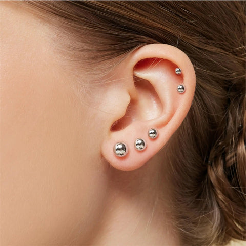Five Pair Tiny Ball Stud Earrings For Women, Hypoallergenic S925 Sterling Silver Jewelry Set, Five Color Options Rose Gold Gold Silver Black Pearl, Includes Five Sizes For Daily Sparkle. Silver ball studs worn on ear, 3 sizes
