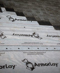 Top Shelf Synthetic Roof Underlayment Roll Covers 10 Squares Heavy Duty Waterproof Barrier laid on a roof deck.