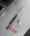 Ultra Thin EDC Knife With 2.9 Inch S35VN Blade And Titanium Handle shown closed on desk with 0.279 inch thickness