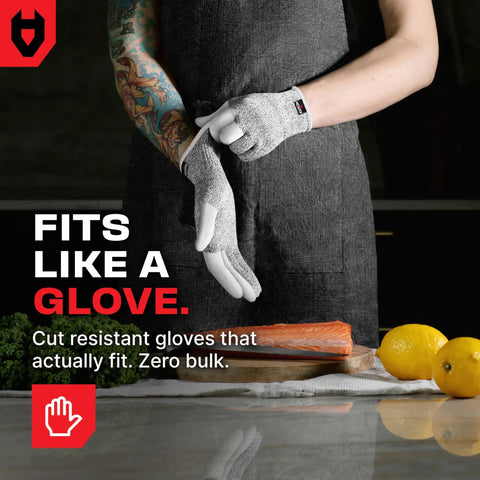 Person wearing Three Finger Reinforced Cut Resistant Kitchen Gloves For Women And Men With Stainless Steel Thread Protection