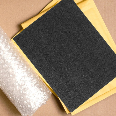 Black Foam Storage Box With Sponge Padding For Electronics And Household Items, with bubble wrap and envelopes