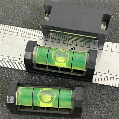 2Pack Magnetic Bubble Levels With Heavy Duty Iron Grip Solid Acrylic Spirit Level Delivers Knockout Precision Layout Readings for swift framing work on a ruler.