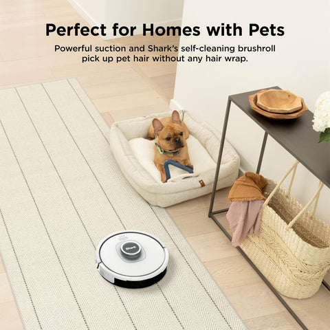 Matrix Clean Robot Vacuum With Serious Suction For Pet Hair On Carpets And Hard Floors in a home setting with a pet bed nearby