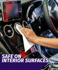 Person using Auto Wipes For Cars And Screens Quick Streak Free Shine Ammonia Free Cleaner Wipes on car dashboard and screen