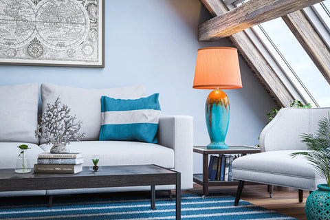 Colorful living room with blue and orange globe lamp on side table