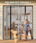 Child and dog walking through Magnetic Screen Door For 60x80 Inch Doors With Magnetic Closure And Heavy Duty Mesh, fits 62x81