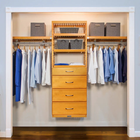 Custom Cut Wall Mounted Closet Organizer System Featuring Heavy Duty Wooden Shelving And Four Deep Soft Close Drawers With Slick Sliding Tracks Crafted From Pure Maple Wood For Top Shelf Walk In Storage with hanging shirts.