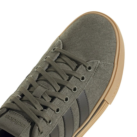 Close-up of Daily 4.0 Mens Skate Sneakers with flexible textile upper, reinforced toe guard, size 10.5, showing lace and toe detail.