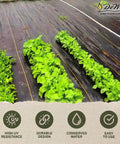 Pro-5 Heavy-Duty Weed Barrier Fabric 5 oz ground cover mat installed in garden with vegetables growing through fabric