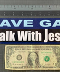 Christian Car Magnet Decal 2.75 By 9.5 Inches White And Red Magnetic Sticker For Cars Faith Based Message To Save Gas And Walk With Jesus Made In The USA Durable Weather Ready Magnetic Decal shown next to a dollar bill for size comparison.