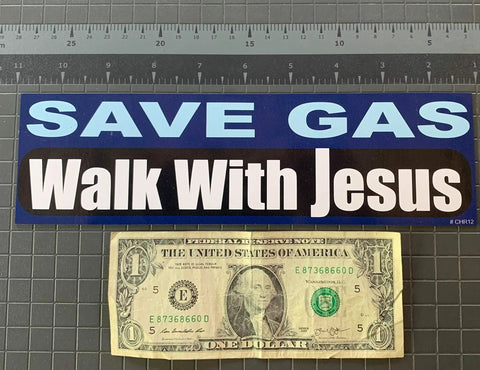 Christian Car Magnet Decal 2.75 By 9.5 Inches White And Red Magnetic Sticker For Cars Faith Based Message To Save Gas And Walk With Jesus Made In The USA Durable Weather Ready Magnetic Decal shown next to a dollar bill for size comparison.