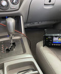 Car Auxiliary 12V Power Plug Adapter Cable for Ham Radio with Mini Tamiya Connector, shown plugged into vehicle 12V outlet.