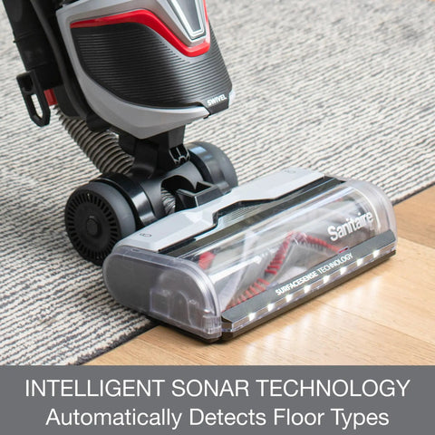 Commercial Grade Upright Vacuum Featuring Adaptive Surface Sensing Automation Alongside Long Lasting Motors on hard floor.