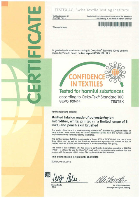 Front view of a textile testing certificate with Confidence in Textiles seal and signatures.