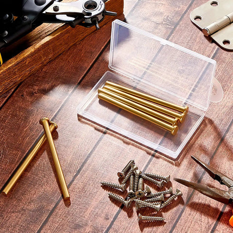 6 Pack Door Hinge Pins 3.5 Inch Legit Oil Rubbed Bronze And Gold Heavy Duty Stainless Steel displayed in clear case on wooden surface.