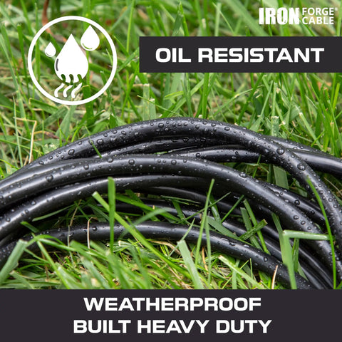 Heavy Duty 12 Gauge Extension Cord With Multi Outlets 100 Foot Black Oil Resistant Jacket lying on wet grass.