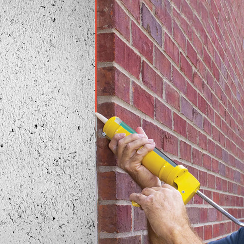 Applying P625 Crack Flex Sealant White 12 Pack DIY Friendly Polyurethane Construction Sealant For All Joints to brick wall corner