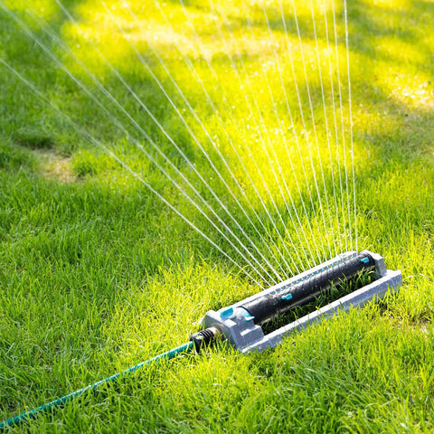 Beefy Heavy Duty Oscillating Sprinkler With 18 Hole Nozzle Zinc Alloy Base Adjustable Flow Control on grass