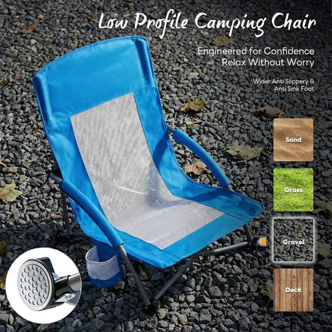 Low Profile Folding Beach Chair With Cup Holders And Carry Bag, Extra Wide Seat and mesh back, on gravel, blue color.