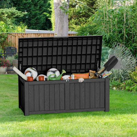 All Weather Outdoor Storage Box Bench, 150 Gallon Lockable And Waterproof Storage Chest filled with garden tools and accessories in Onyx Black on patio.