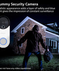 Image of a Wireless Security Doorbell Kit with Realistic Decoy Cam and Motion Activated Light, mounted outside at night