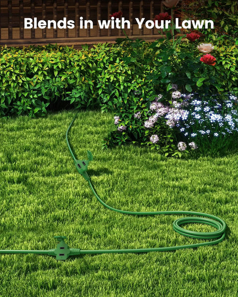 Heavy Duty 25 Foot Outdoor Extension Cord With Triple Waterproof Outlets For Patio Parties And Holiday Displays on green lawn