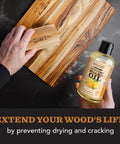 Cutting Board Oil With Lemon And Orange Oils Food Grade Mineral Oil For Cutting Boards And All Wood Surfaces Keeps Your Boards Looking Fresh Restores And Protects Butcher Block Nourishing Conditioner 12 Oz bottle next to wooden board