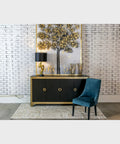 Chic Belle Resin Table Lamp In Gold And Black, Hand Painted Antique Finish, 15 By 29.88 Inches, on sideboard in modern room