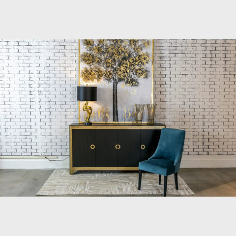 Chic Belle Resin Table Lamp In Gold And Black, Hand Painted Antique Finish, 15 By 29.88 Inches, on sideboard in modern room