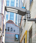 90 Degree Wall Mount L Shape Bracket For Slip Fit LED Lights installed on brick building wall outdoors