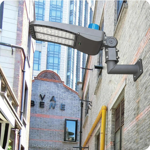 90 Degree Wall Mount L Shape Bracket For Slip Fit LED Lights installed on brick building wall outdoors