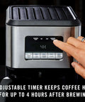 Front view of Programmable Coffee Maker With Glass Carafe, 14 Cup Capacity, Stainless Steel Finish, showing control panel