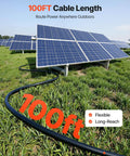 Beefy Heavy Duty Solar Panel Extension Cable Kit 100 Ft Black and 100 Ft Red, 10 AWG cable stretching near solar panels outdoors.