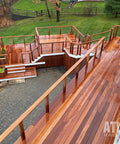 Wooden deck with HandiSwage Flush Fittings for 1/8 inch cable railing, showcasing clean minimal obstruction and easy tensioning.