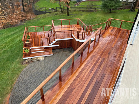 Wooden deck with HandiSwage Flush Fittings for 1/8 inch cable railing, showcasing clean minimal obstruction and easy tensioning.