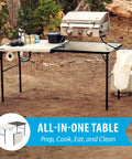 Folding Tailgate Table With Grill Rack For Outdoor Camping And Grilling, 5 Foot Portable Prep Station, setup in forest