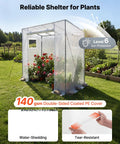 Walk In Greenhouse For Outdoors With Windows PE Cover Roll Up Zipper Door in garden with plants inside