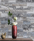 Peel And Stick Tile Backsplash Kit 102 Piece 3 By 6 Inch Distressed Wood Subway Planks behind vase on wooden table