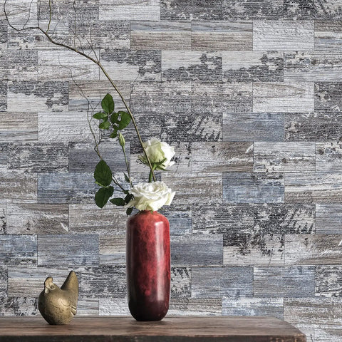 Peel And Stick Tile Backsplash Kit 102 Piece 3 By 6 Inch Distressed Wood Subway Planks behind vase on wooden table