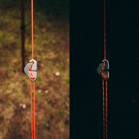 Paracord 175 Lightweight Visible Guyline For Tents And Tarps Reflective Orange 100 Ft Camping Cord with metal clip in day and night view