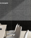 Modern office with Acoustic Wall Panels 10 Pack For Home Studio And Office, Noise Blocking Sound Absorbing Plain Black Felt Panels, 47 By 23 Inches Each, Recycled PET Material, Covers About 77.35 Sq Ft, visible on the wall, enhancing acoustics.