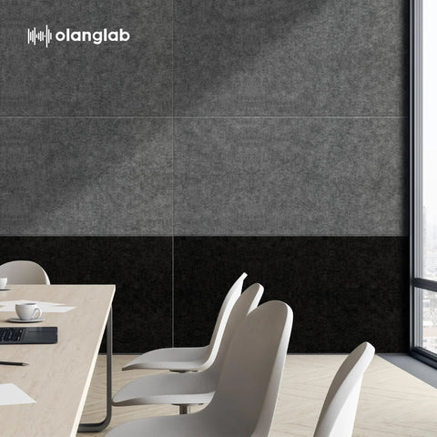 Modern office with Acoustic Wall Panels 10 Pack For Home Studio And Office, Noise Blocking Sound Absorbing Plain Black Felt Panels, 47 By 23 Inches Each, Recycled PET Material, Covers About 77.35 Sq Ft, visible on the wall, enhancing acoustics.